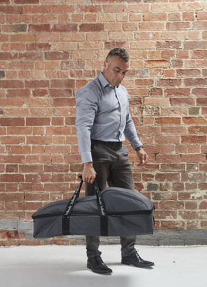 Man holding a InBody black bag 